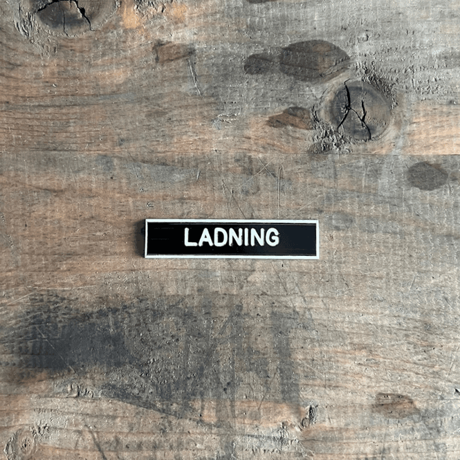 Hovedbilde Panelskilt Ladning